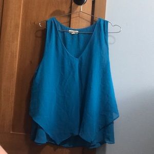 blue sleeveless blouse